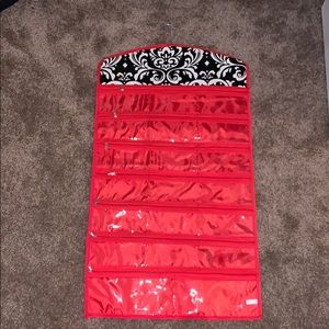 Double sided hanging storage unit